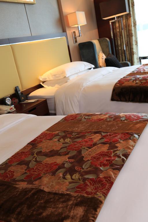 Guangzhou Changfeng Gloria Plaza Hotel Szoba fotó